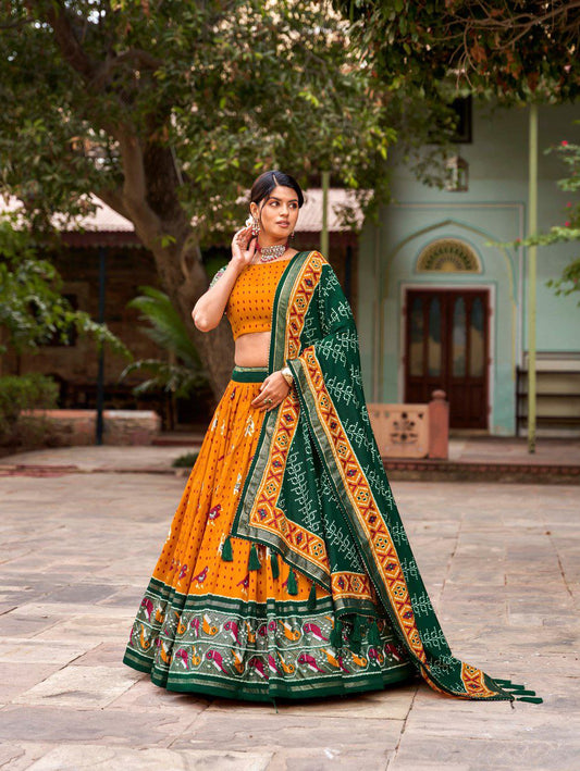 Shop Orange Ikat Patola Lehenga Set Online | Vaanya Kurtis