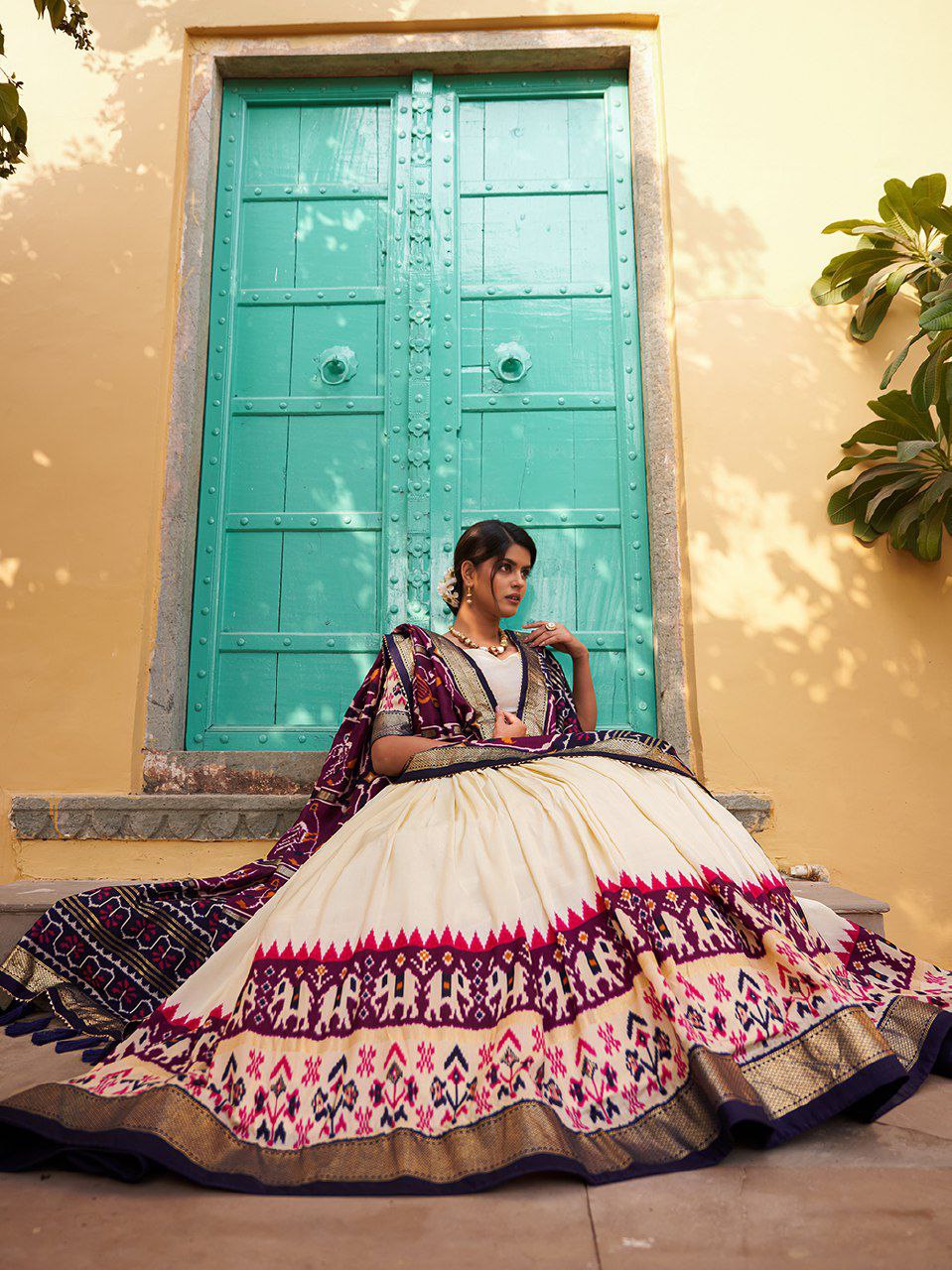 Shop White Beautiful Ikat Patola Lehenga Set | Vaanya Kurtis