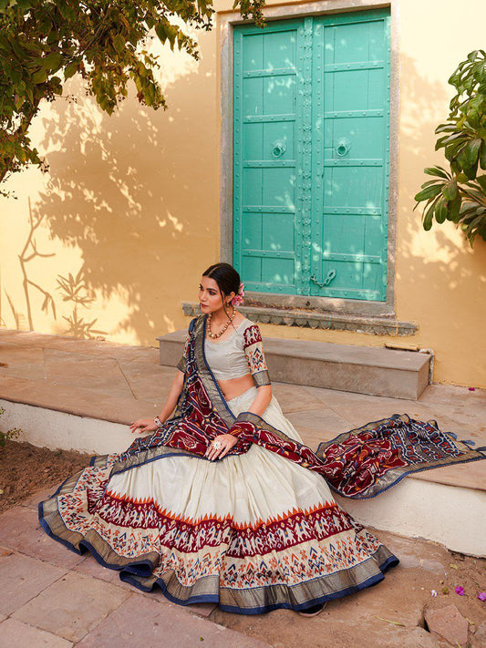 Stylish White Ikat Patola Lehenga Set with Maroon Dupatta