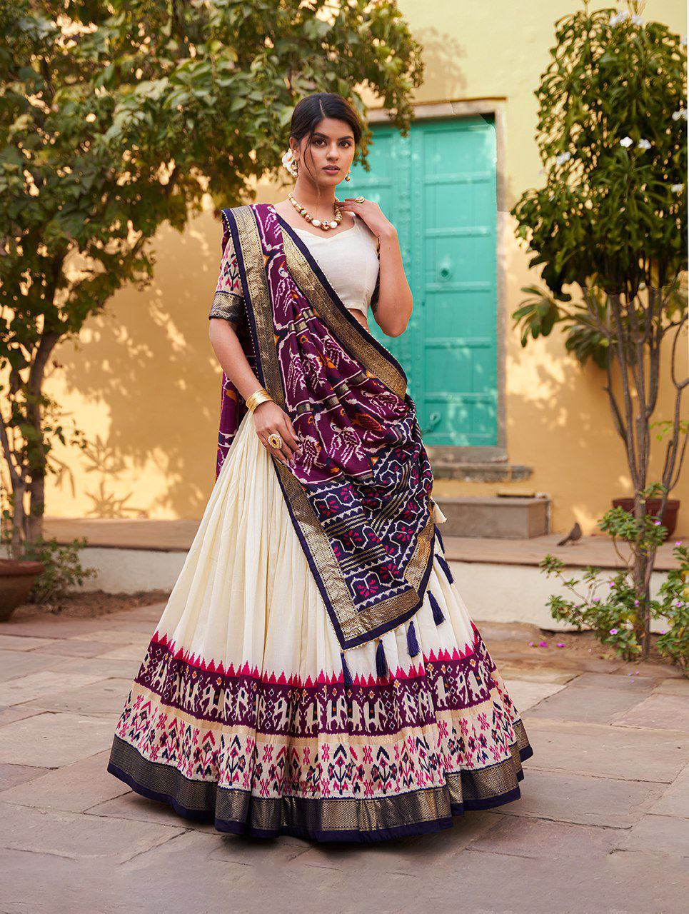 Shop White Beautiful Ikat Patola Lehenga Set | Vaanya Kurtis