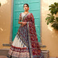 Stylish White Ikat Patola Lehenga Set with Maroon Dupatta