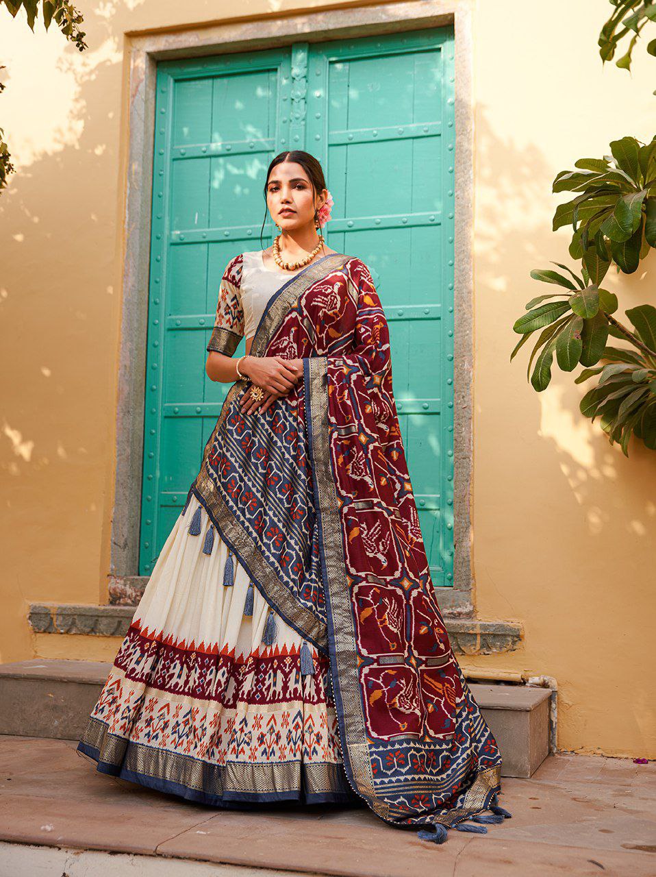 Stylish White Ikat Patola Lehenga Set with Maroon Dupatta